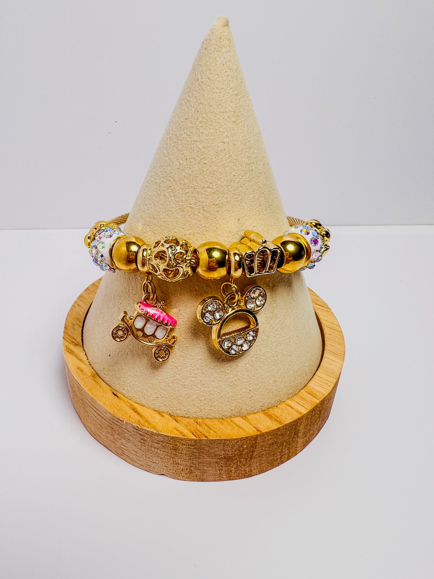 Pink carriage/mouse ear charm bracelet (gold)