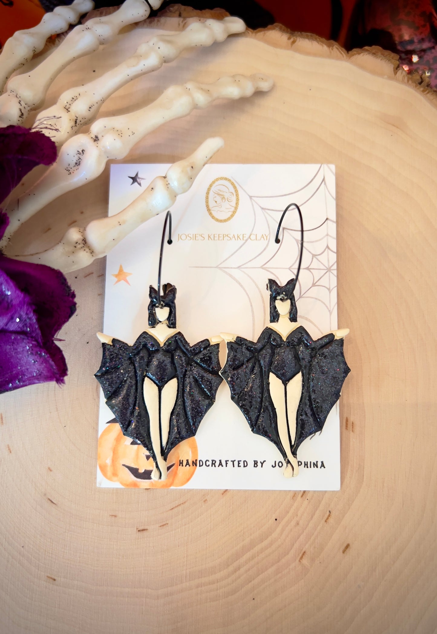 Hand painted bat woman earrings