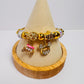 Pink carriage/mouse ear charm bracelet (gold)